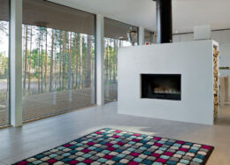 Plus Villa - Massivholzhaus in Finnland – Kamin